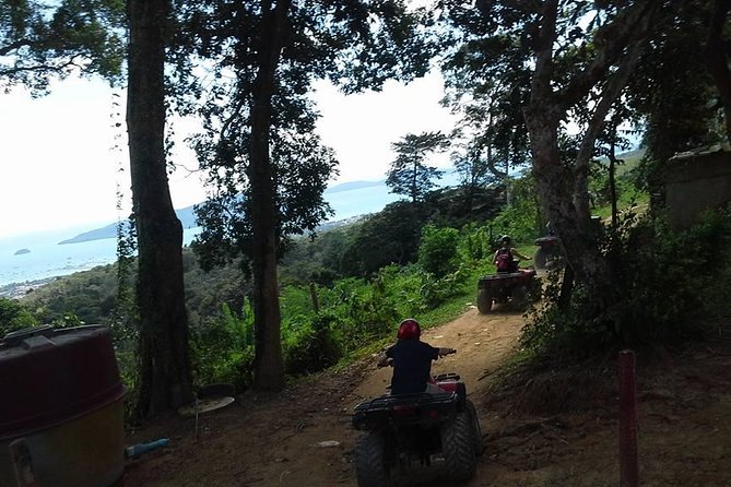 ATV Phuket Tours - Riding in Rain: Ponchos and the Mood Shift