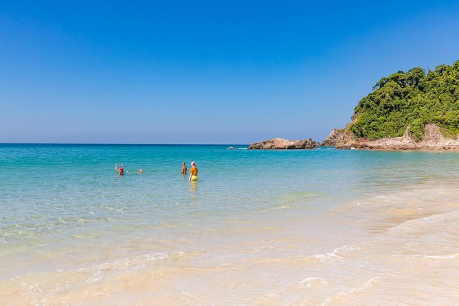 Bamboo Rafting and Eco Delight Story PRIVATE 4 persons - From Phuket - Wat Tha Sai beachside temple: teak wood and a white jade Buddha image
