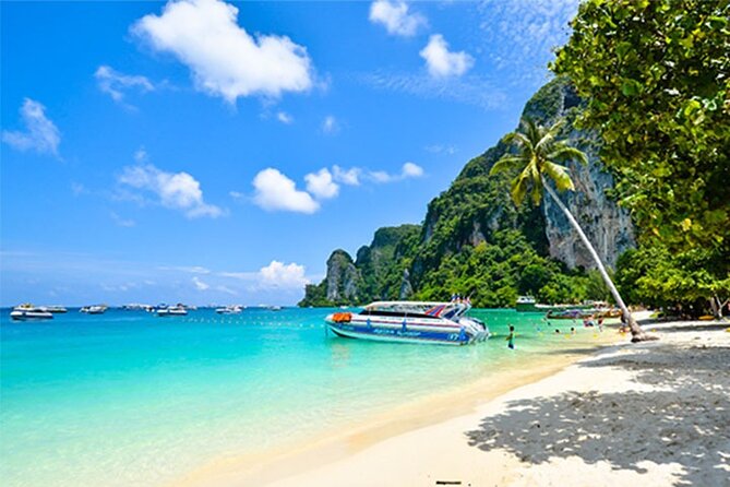 Explore Phi Phi, Maya Bay & Khai Island with Lunch from Phuket - Khai Nok Island Beach Time: Swim, Snorkel, and Feed the Fish