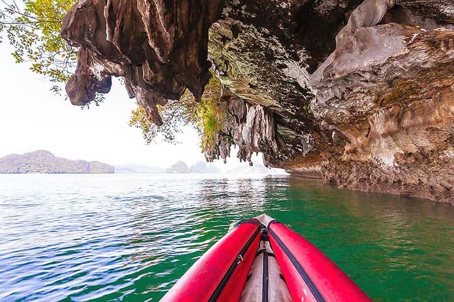From Phuket: James Bond Sunset Boat Tour & Canoe Adventure - Sunset dinner and glowing plankton: the night show you plan your whole day for