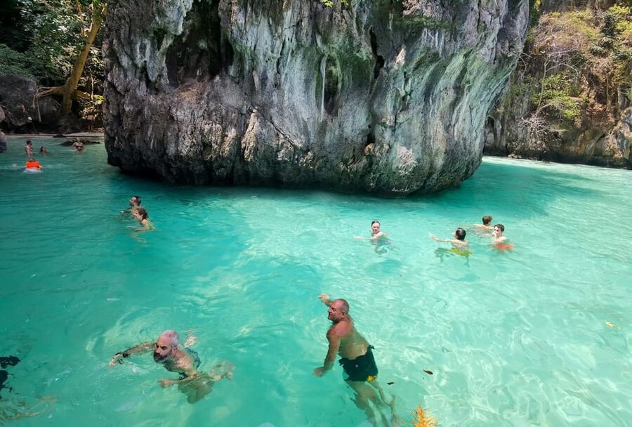 From Phuket: Krabi Transfer with Phi Phi Longtail Boat Tour - Maya Bay: cinematic views, limited swimming, and that shoreline shark moment