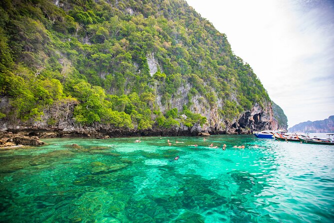 From Phuket: Phi Phi, Maya Bay & Khai Islands Speedboat Tour - Snorkeling gear, paddle boards, and a clear canoe: what’s included and what that means