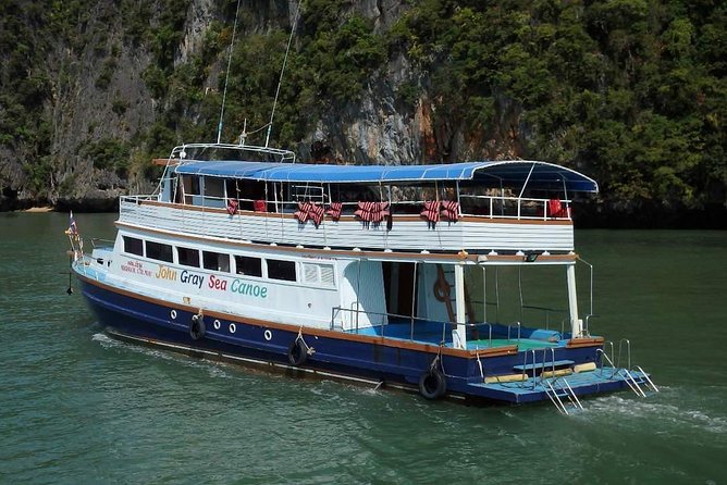 Hong by Starlight John Gray's Sea Canoe - Stop 2: Koh Panak Cave sea-canoeing (tight passage vibes)