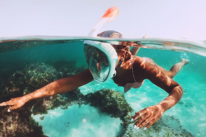 Khai Islands Speedboat Trip Half Day Tour - Stop 2: Khai Nui Snorkeling Window for Corals and Fish (About 20 Minutes)