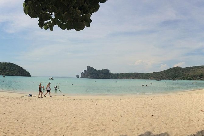 One Day Phi Phi Islands Trip By Ferry From Phuket - Ko Phi Phi Le: caves and boat-only swim potential