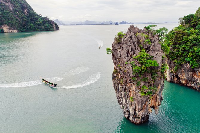 Phang Nga Bay Day Trip from Phuket by Speedboat - Talu Island Canoe Experience: Moving Through Limestone Lagoons