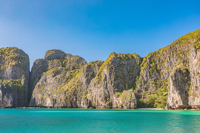 Phi Phi & Bamboo Island Full Day Tour by Premium Speed-Catamaran - Stop 5: Ko Phi Phi Don snorkeling where the water does the talking