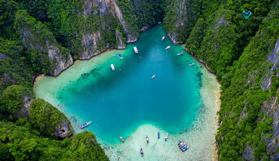 Phi Phi Islands: 2 Days, 1 Night Trip with Activities - Long-Tail Boat Day: Maya Beach, Pileh Lagoon, Caves, and Quick Swim Stops