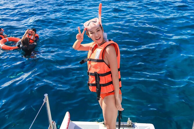 Phuket Catamaran Snorkel & Sunset: Coral & Racha - Chalong Pier to Racha Yai: the long-tail hop that sets the tone