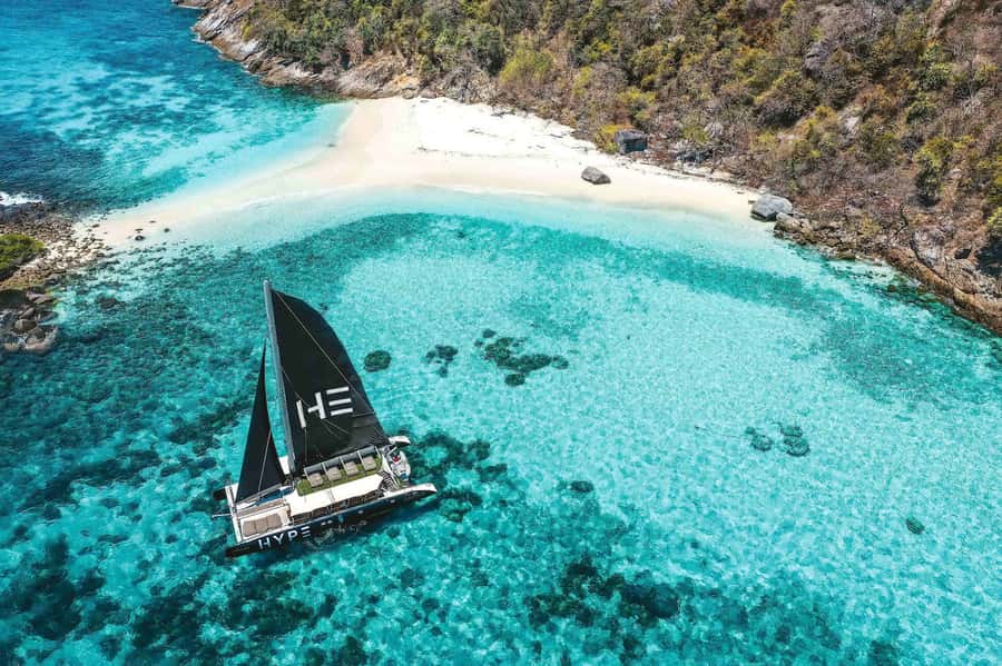 Phuket: Coral and Racha Islands Hype Luxury Catamaran - Coral Island Stop: beach time with a real-world caution