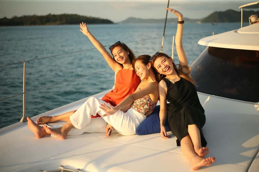 Phuket: Coral Island Day Trip and Sunset Dinner by Catamaran - Kahung Beach time: swimming, sand, and the best use of your beach chair