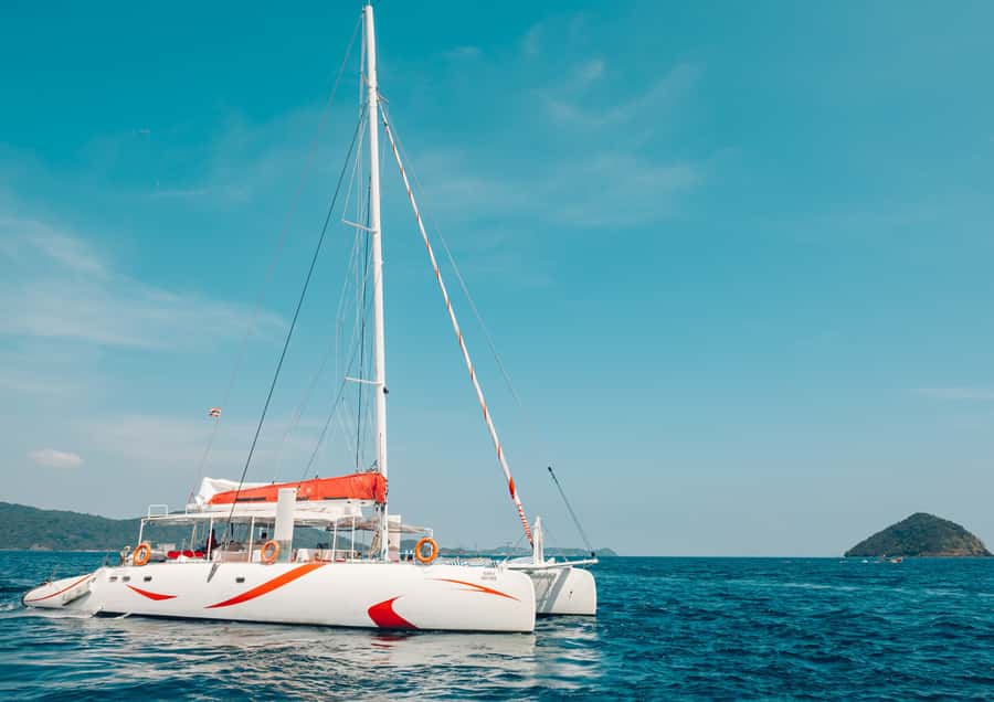 Phuket: Coral, Racha, Promthep Island Catamaran Trip & Lunch - Coral Island vs Racha: two different moods in one tour