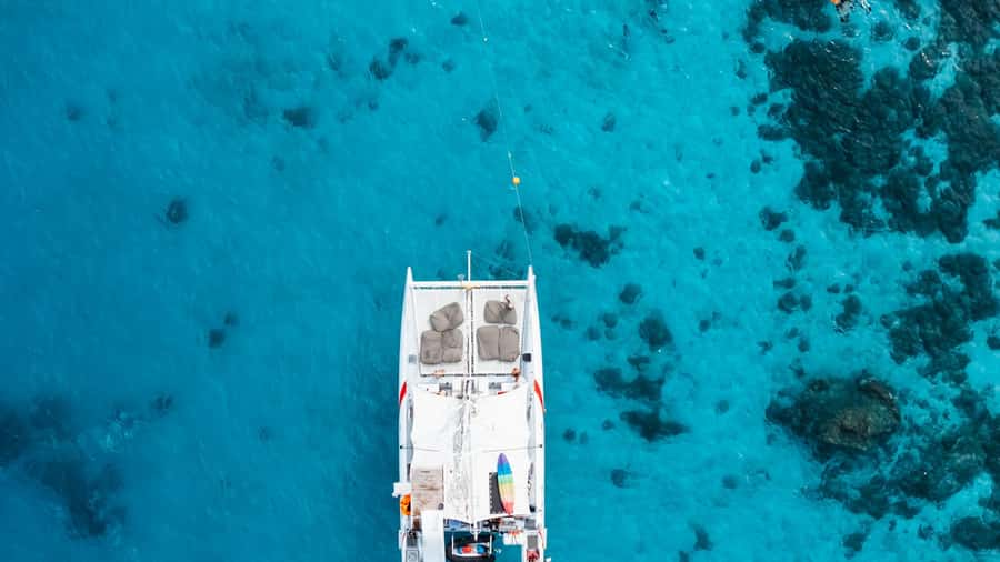 Phuket: Coral, Racha, Promthep Island Catamaran Trip & Lunch - Water sports and beach time: what’s available and how to handle extra costs