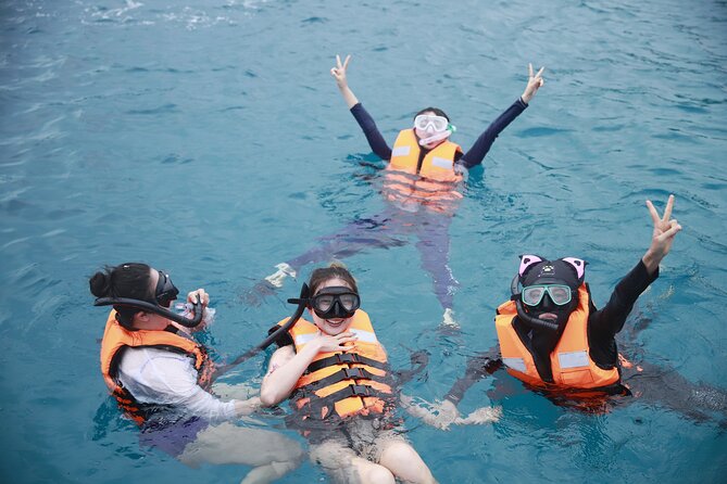 Phuket: Islands Hopping Catamaran Tour with Foam Party - Coral Island: lunch first, then snorkeling and optional thrill rides