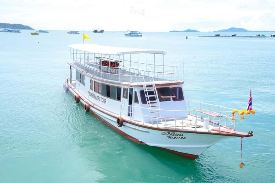 Phuket: James Bond Island and Canoeing Day Tour by Boat - Ao Por Pier and the Big Wooden Boat: Comfort Counts in Heat