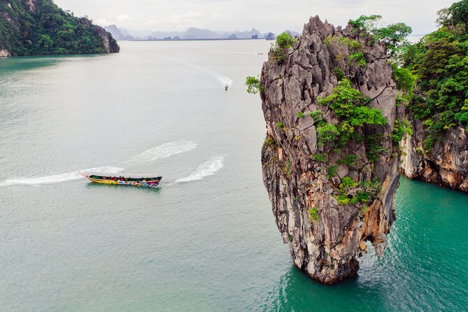 Phuket: James Bond Island + Canoe Longtail Small Group Boat Tour - Stop 4: James Bond Island and the 20-meter limestone cliff