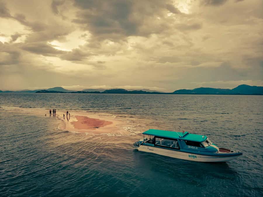 Phuket: Phi Phi Island Sunrise Group Speedboat Tour - Khai Islands sunrise moment: small stop, big payoff
