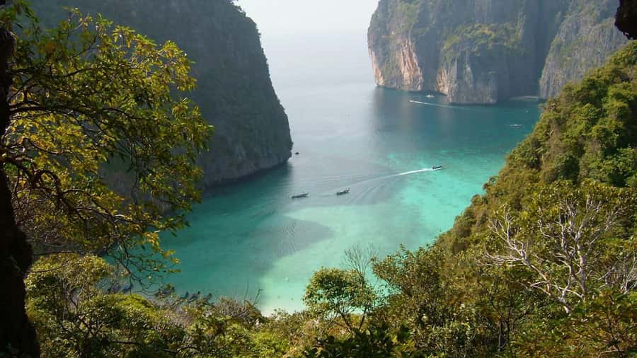 Phuket: Phi Phi Island Sunrise Group Speedboat Tour - Maya Bay at first light: the beach everyone dreams about