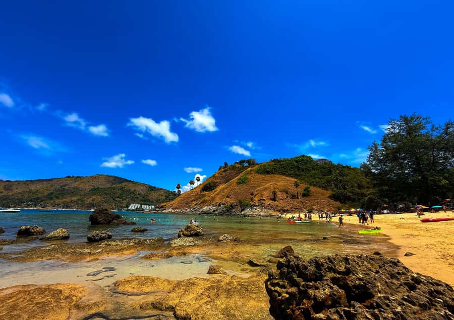 Phuket: PromthepCape,Swim Ya-Nui Beach,Buddha,Chalong Temple - Getting picked up and getting oriented fast