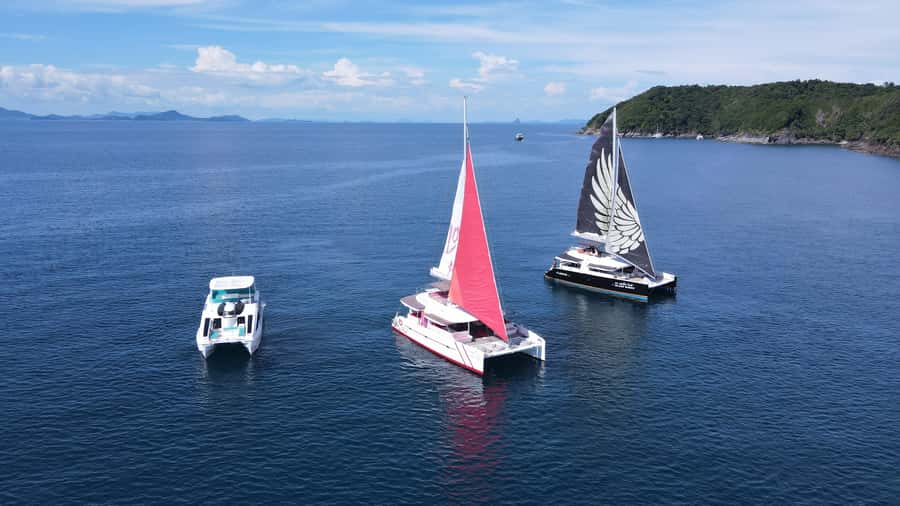 Phuket: Racha and Coral Island Sailing Day Trip by Miss.Red - Coral Island (morning): beach breaks and optional water activities