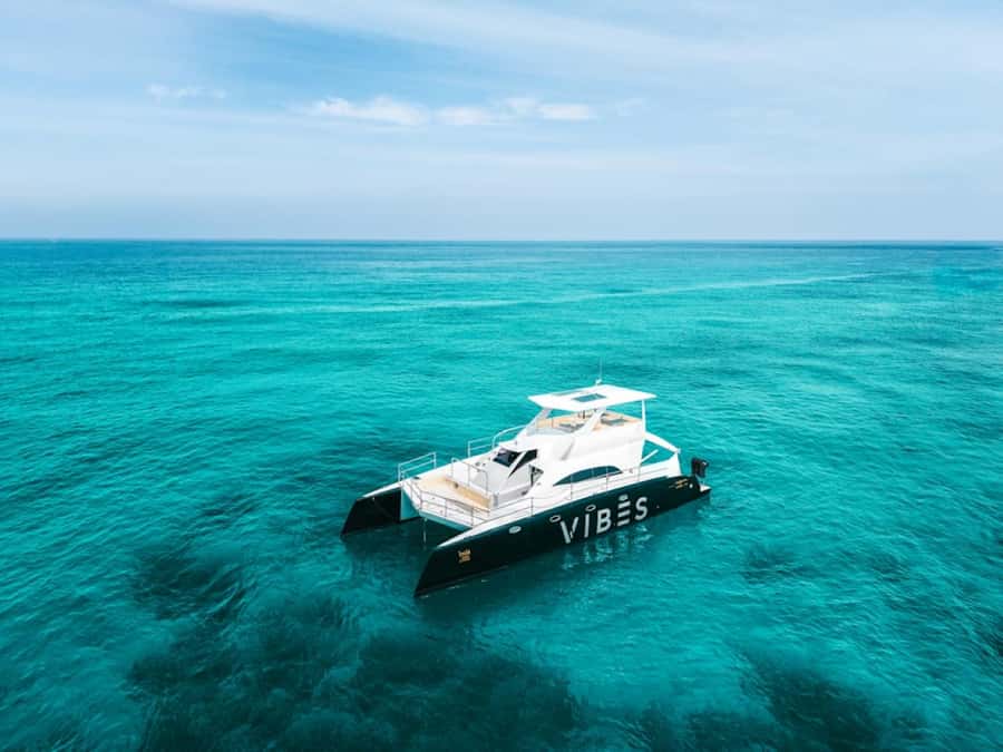 Phuket: Racha Noi & Maiton Catmaran Tour with Beach Picnic - Racha Yai: lunch onboard, second snorkeling, then white-sand beach time