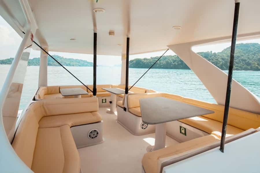 Phuket: Racha Noi & Maiton Catmaran Tour with Beach Picnic - Morning pickup and the catamaran rhythm out of Phuket