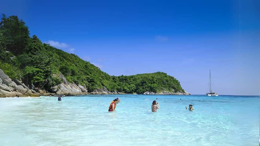Phuket: Raya Island, Maithon Island, & Dolphin Spotting Tour - Banana Bay snorkeling: where reef time actually happens
