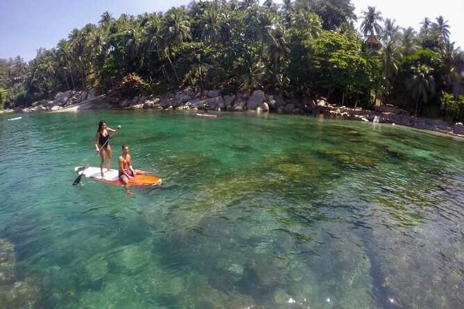Phuket Stand Up Paddle Board Tour - Private beaches, a snack-sized break, and snorkeling in clear water