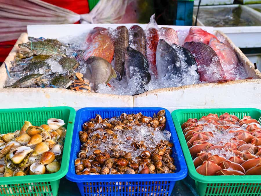 Phuket: Sunset View and Seafood Market Dinner Guided Tour - Rawai’s Sea Gypsies Fish Market: Seafood Shopping With a Real Local Coach