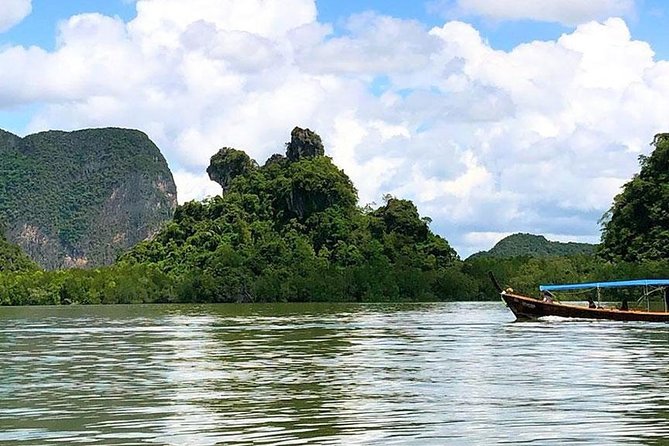 Phuket to James Bond Island Tour Including Sea Canoeing by Longtail Boat - Suwan Khuha Temple: the golden reclining Buddha stop
