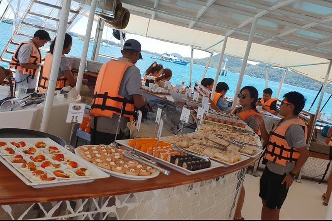 Phuket VIP Hype Luxury Boat Cruise with Party & DJ Vibes - Raya Yai Island: Snorkeling and the “Water Time” Portion