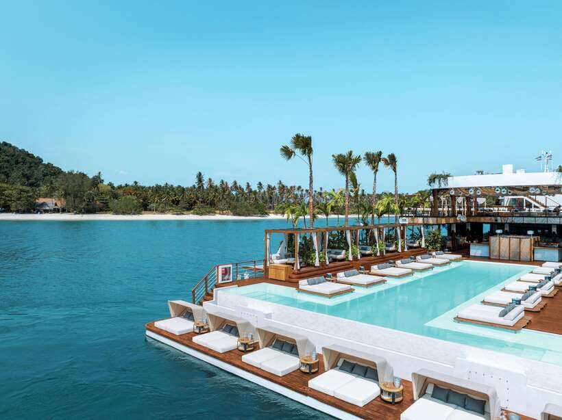 Phuket: YONA Floating Beach Club Day Experience - Getting there: check-in piers, shuttle boat ride, and why timing matters