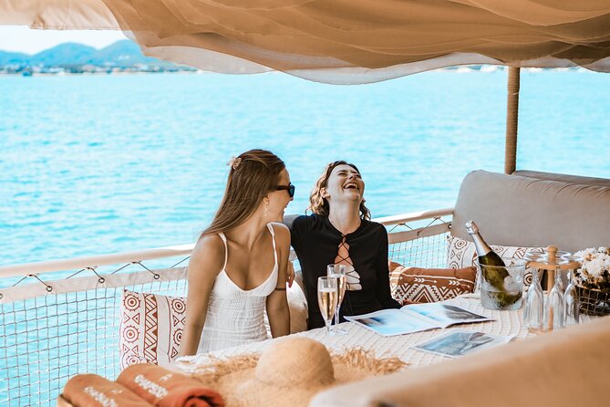 Rhapsody Phuket Coral & Racha Sunset Catamaran Cruise - Coral Island beach time: fun, sun, and optional add-ons