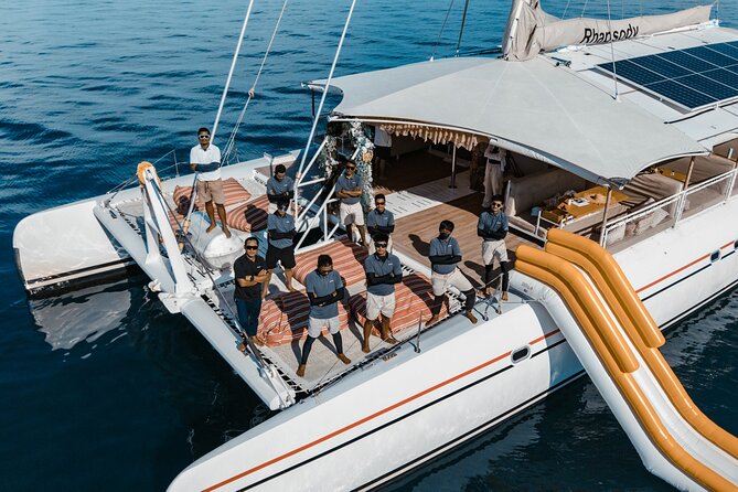 Rhapsody Phuket Coral & Racha Sunset Catamaran Cruise - Sea-view party near Promthep Cape: the sunset timing you’ll feel